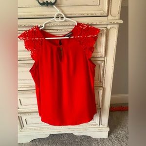 Red express blouse with lace details on arms